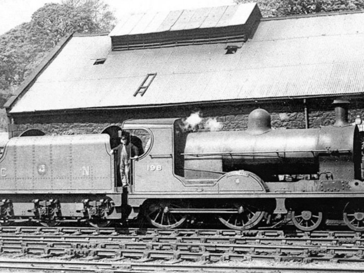 U class No.198 'Lough Swilly' and tender 43 alongside Enniskillen locomotive shed with Driver Jimmy Kelly.