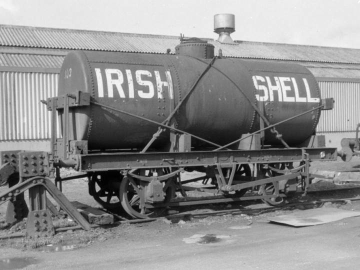 303, a similar wagon to 602, at Belfast's Maysfields goods yards in 1964. This is the Class B livery for wagons carrying less volatile heavy oils such as diesel or bitumen. (D.Coakham)