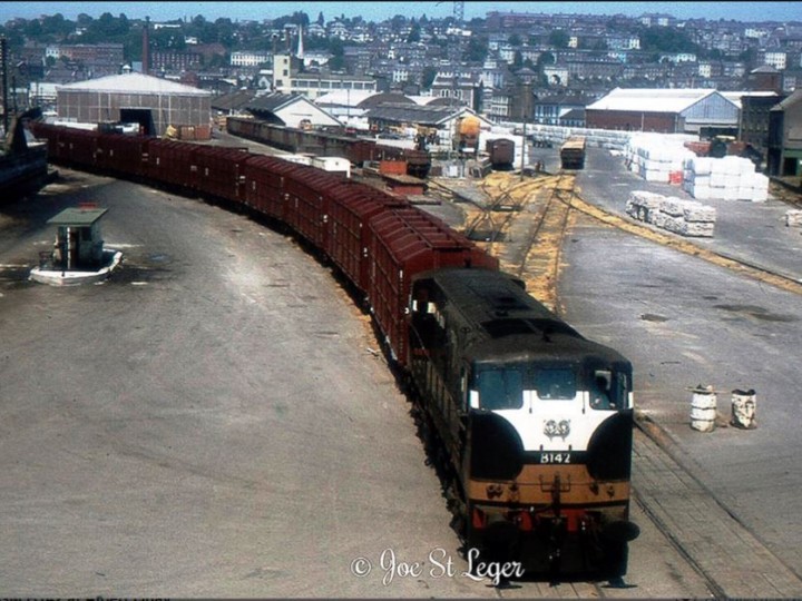 1974: B142 at Albert Quay Goods Yard, Cork. Imagine the sight of this when it was crossing Brian Boru Bridge!
Albert Quay closed to passengers on 1st April 1961. Tar and fertiliser traffic started 3rd November 1965; by then the station was only in use as a siding. It finally closed in September 1976.