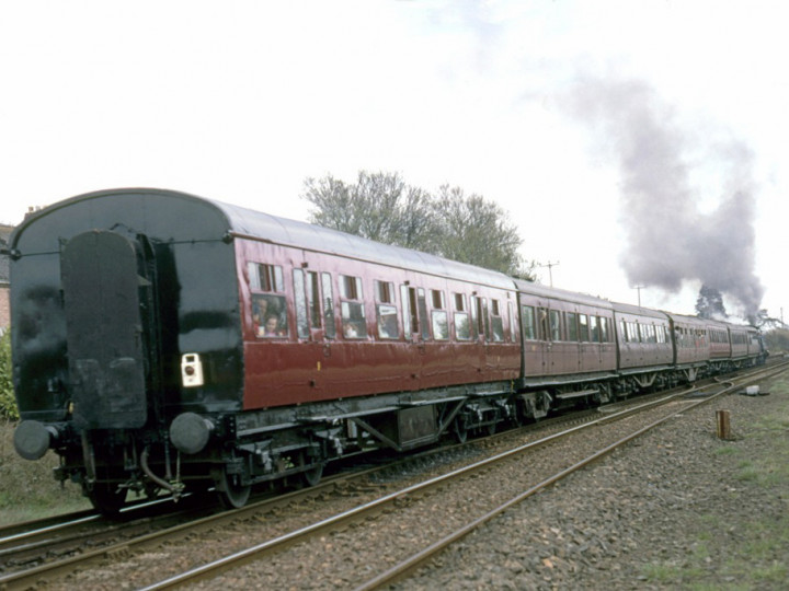31/3/1997: Now in maroon livery, 9 at Greenisland on rear of the Easter Bunny from Belfast Central to Whitehead. (C.P. Friel)