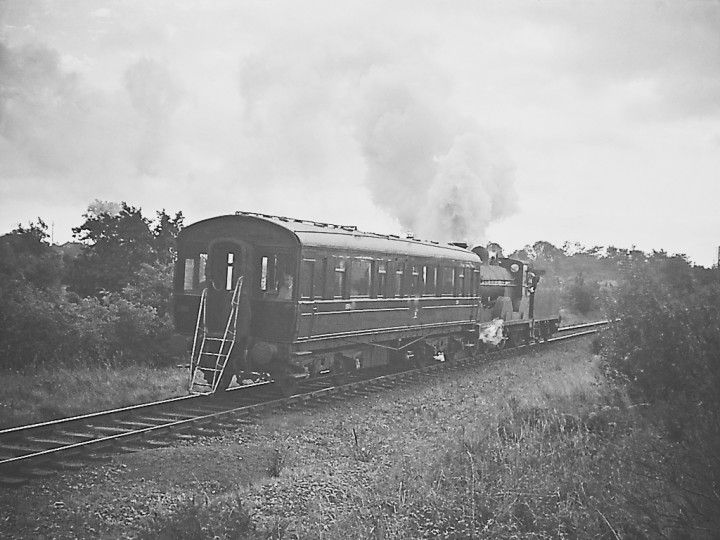 Locomotive No.170 propelling the saloon towards Annaghmore, possibly 1964 pre-closure inspection trip. (RPSI Collection)