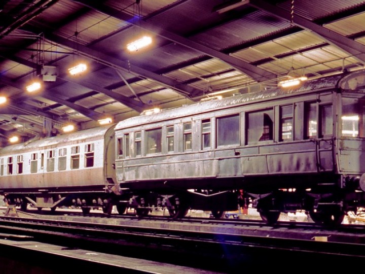 Late 1970s: RPSI carriages 87 (UTA diner) and 50 (GNR Saloon) in NIR's York Road running shed. (C.P .Friel)