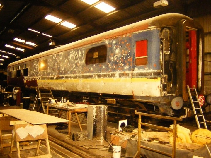 A sad fact of life is that some people spent their time throwing stones at trains. In 547's 27 years she had been on the receiving end of many attacks. The dents in her sides do not pose a structural problem, but the look unsightly, and are seen here being filled with isopon.